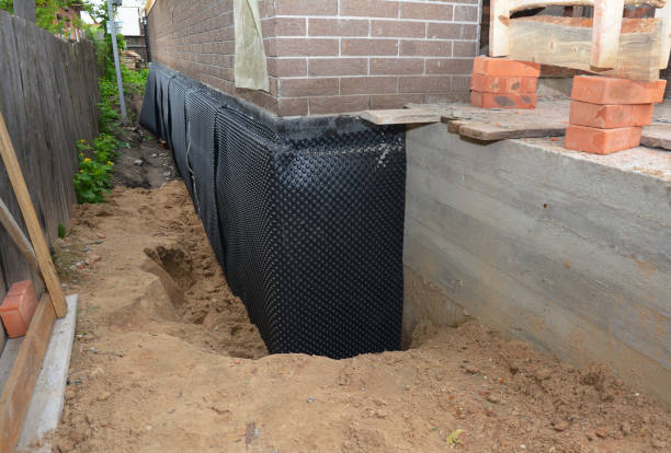 Happy homeowners after waterproofing job in Fairwater